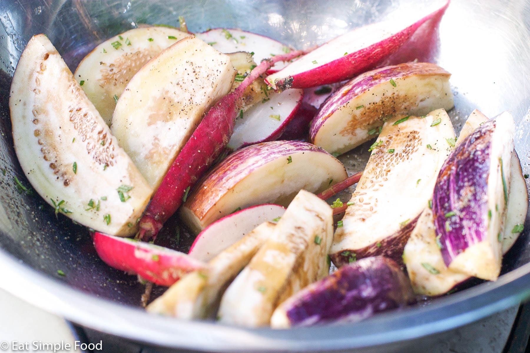 Bowl of sliced eggplant varieties..