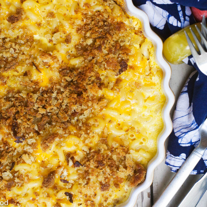 Close up of elbow Macaroni & Yellow Cheddar Cheese Pie topped with golden buttery breadcrumbs.