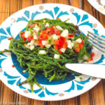 Sea Bean Salad Close Up On a White/Blue Plate w/ diced Cucumbers & Red Peppers | EatSimpleFood.com
