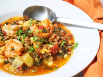 Shrimp and Chorizo Stew w Potatoes and Corn Recipe in A White Bowl - Eat Simple Food