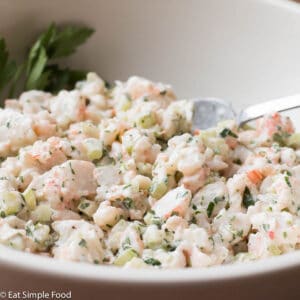 Shrimp Salad w/ Horseradish, Chives, Lemon In A White Bowl.