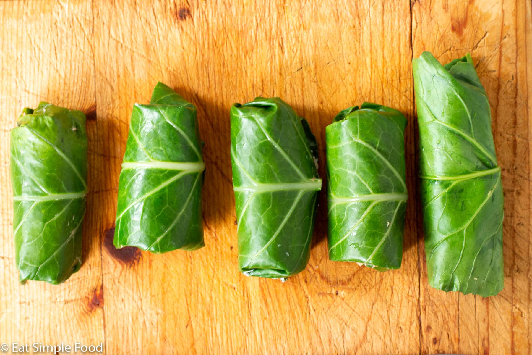 Top view of wrapped Collard green "burritos"
