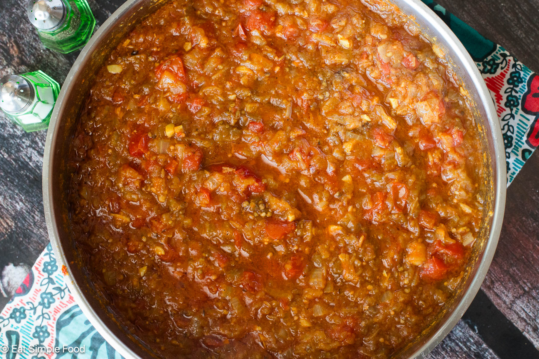 Stainless steel saucepan of red curry. Top down view.